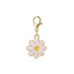 Detailed macro view of a daisy flower charm with a gold lobster clasp for DIY jewelry