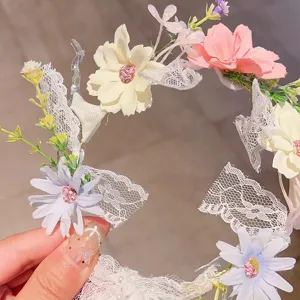 Detailed close-up view of fairy floral headband with lace and pink white flowers for girls