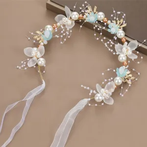 Elegant floral hair wreath for children featuring white pearls, blue flowers and ribbons