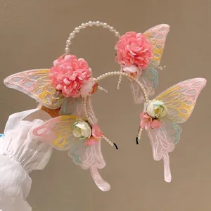 Cerchietto a farfalla e fiori con perle per cosplay Lolita e servizi fotografici.