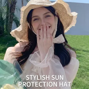 French style straw sun hat with elegant lace ties and wide brim for beach sun protection