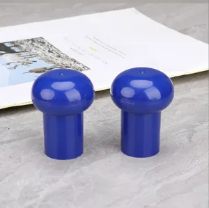 Detailed view of blue plastic perfume bottle crimp press tool adapter for snap spray nozzles.