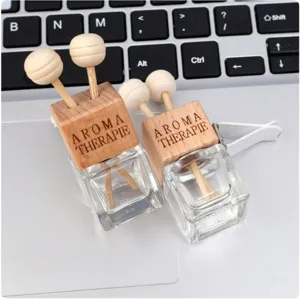 Square glass car air vent perfume diffuser bottle empty aromatherapy container with wooden clip.