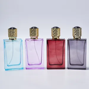 50ml square refillable glass perfume bottles set with luxurious gold textured caps and atomizers.