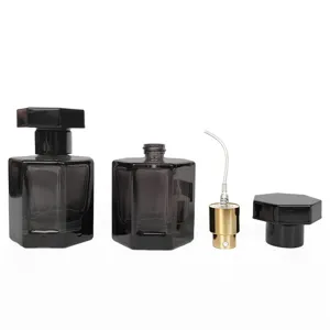 Flacon vaporisateur de parfum en verre portable avec bouchon hexagonal et pompe, idéal voyage.