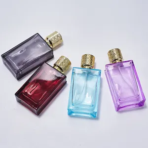 Detailed view of 50ml glass perfume sub-bottling bottle with luxury gold texture cap.