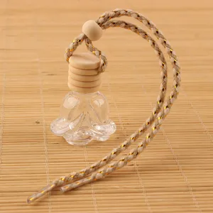 Flacon de parfum de voiture en rose en verre vide suspendu avec bouchon en bois corde.