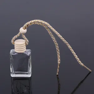 Flacone di profumo vuoto in vetro per auto con tappo in legno e corda di sospensione per specchietto.