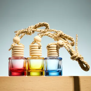 Hanging car perfume glass bottle set with wooden cap and colorful liquid for fresh air diffusers.
