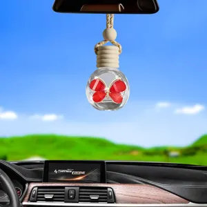 Flacone di profumo sospeso per auto diffusore aromaterapia in vetro con ciondolo farfalla rossa