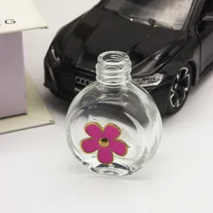 Klares Glas Auto Parfuem Flasche leere runde Flasche mit suesser rosa Blume Anhaenger