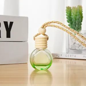 10ml glass car perfume diffuser bottle with wooden cap and hanging rope decoration