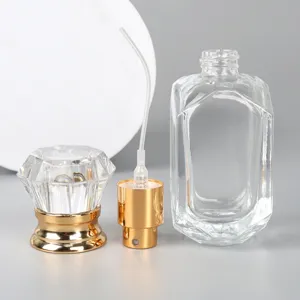 30ml clear glass perfume bottle with diamond crystal cap and gold spray pump for cosmetic packaging