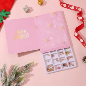 Pink Christmas Advent calendar gift box including DIY bracelet and 24 festive charms