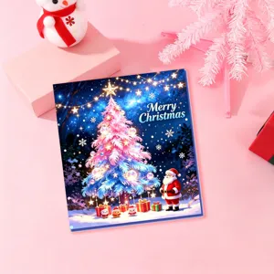 Detail of a festive Christmas advent calendar card with glowing tree and Santa Claus.