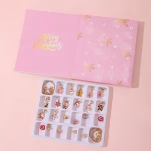 Detailed view of pink Christmas Advent Calendar DIY jewelry kit with 24 charms