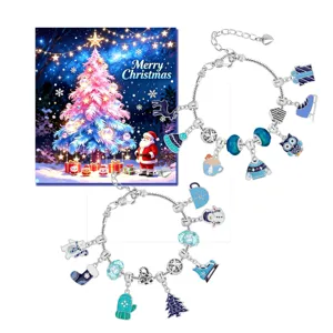 Festive blue Christmas DIY charm bracelet set with winter-themed pendants and beads