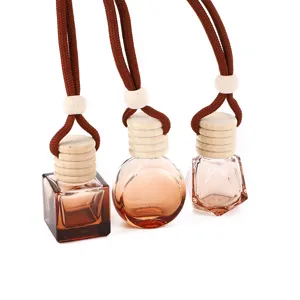 Lot de 3 flacons de parfum de voiture en verre dégradé marron avec bouchon en bois.