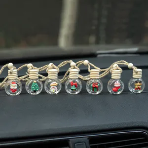 Christmas car hanging perfume glass bottle with cute miniature charms for auto interior.