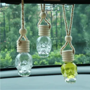 Skull car perfume bottle, glass essential oil diffuser pendant with hanging rope and wooden beads.
