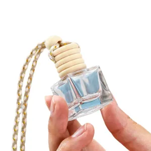 Clear square glass car perfume bottle with wooden cap and hanging rope, empty refillable pendant.