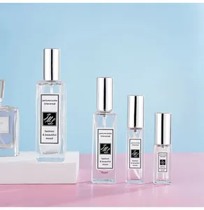 Portable square glass perfume spray sub-bottle, clear cosmetic dispenser bottle detail view.