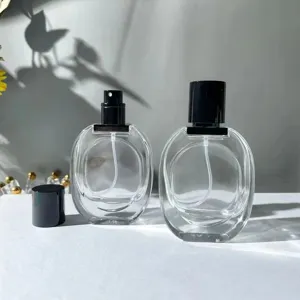 Frasco de spray de perfume de vidrio transparente de 30 ml con bomba negra para viajes.
