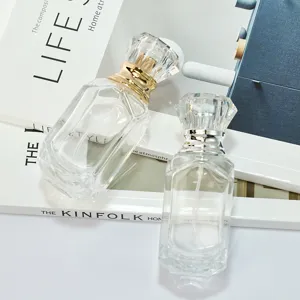 Empty glass perfume bottle with diamond cap, 50ml refillable spray bottle for cosmetics.