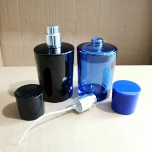 50ml empty glass perfume bottle with spray nozzle, luxury refillable cosmetic container for travel.