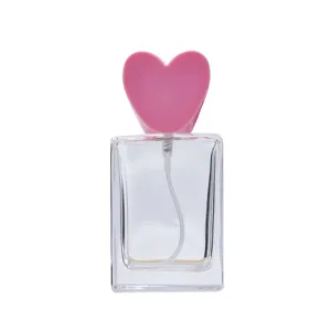 Klares Glas Parfumfläschchen mit süßem rosa Herzdeckel 30ml leere Kosmetik Sprayflasche