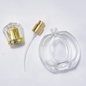 50ml Empty Glass Perfume Bottle with Diamond Cap and Gold Spray Nozzle for DIY Fragrance.