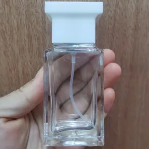 Flacon de parfum en verre clair bouchon blanc 30ml vide vaporisateur échantillon