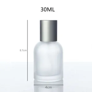 Frosted glass perfume spray bottle 30ml empty cosmetic container with silver cap.