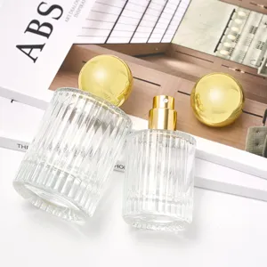 Navulbare glazen parfumfles 50ml lege cosmetische verstuiver met gouden kogel dop spuitpomp.