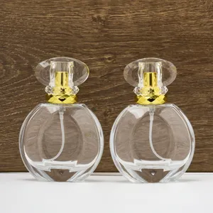 Clear empty glass perfume bottle 50ml refillable cosmetic container with gold cap