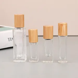 Draagbare Glazen Parfum Rollerfles Essentiële Olie Sub-verpakkingsfles Met Bamboe Deksel En Stalen Bal Reisdispenser