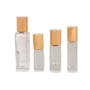 Transparante glazen rollerflessen met bamboe doppen, draagbare lege parfum rollerflessen.