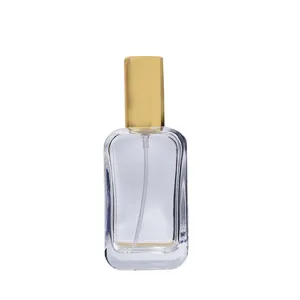 30ml clear glass perfume bottle with gold cap, empty refillable cosmetic spray bottle.