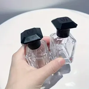 Klares Glas 30ml nachfullbare Parfümflasche mit elegantem schwarzem Deckel für Reisen und Kosmetik.