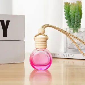 Car perfume bottle hanging glass essential oil diffuser bottle pink liquid wooden cap 10ml