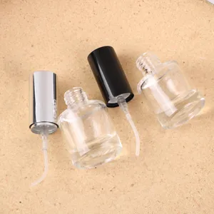Detail shot of 8ml clear glass perfume bottle with spray pump, portable cosmetic sample container.