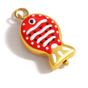 Detailed view of a cute red fish pendant charm with colorful polka dots for jewelry DIY