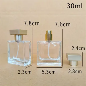Clear glass perfume bottle 30ml empty spray cosmetic container with gold square cap.