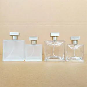 Clear glass perfume spray bottles set, square refillable cosmetic bottles with gold caps.