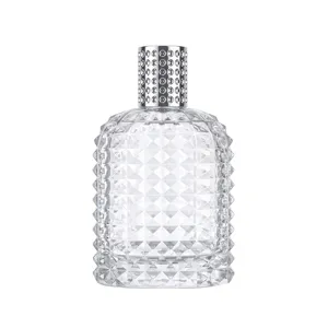 100ml διαφανές γυάλινο άδειο μπουκάλι αρωμάτων με υφή διαμαντιού και μεταλλικό καπάκι.