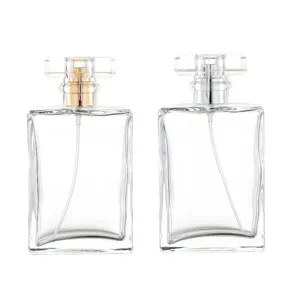 Clear glass square perfume bottle 100ml with crystal cap and fine mist spray pump.