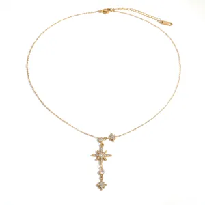 Close-up of elegant gold-plated star pendant necklace with full diamond crystal inlay