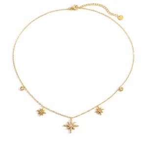 Close-up of the 18k gold-plated stainless steel necklace with star-shaped charms