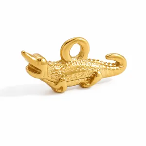 Détail d'un pendentif crocodile doré en 3D pour la création de bijoux artisanaux DIY