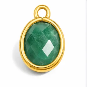 Close-up view of a faceted green natural stone pendant set in a gold stainless steel frame.